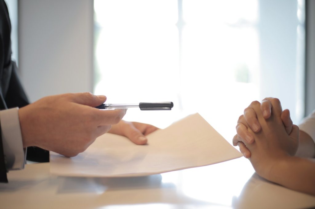 crop businessman giving contract to woman to sign 3760067